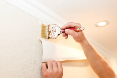 Pose de papier peint à Ménil — revêtements muraux et toiles de verre